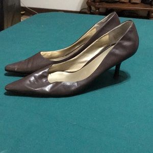 Brown leather pumps